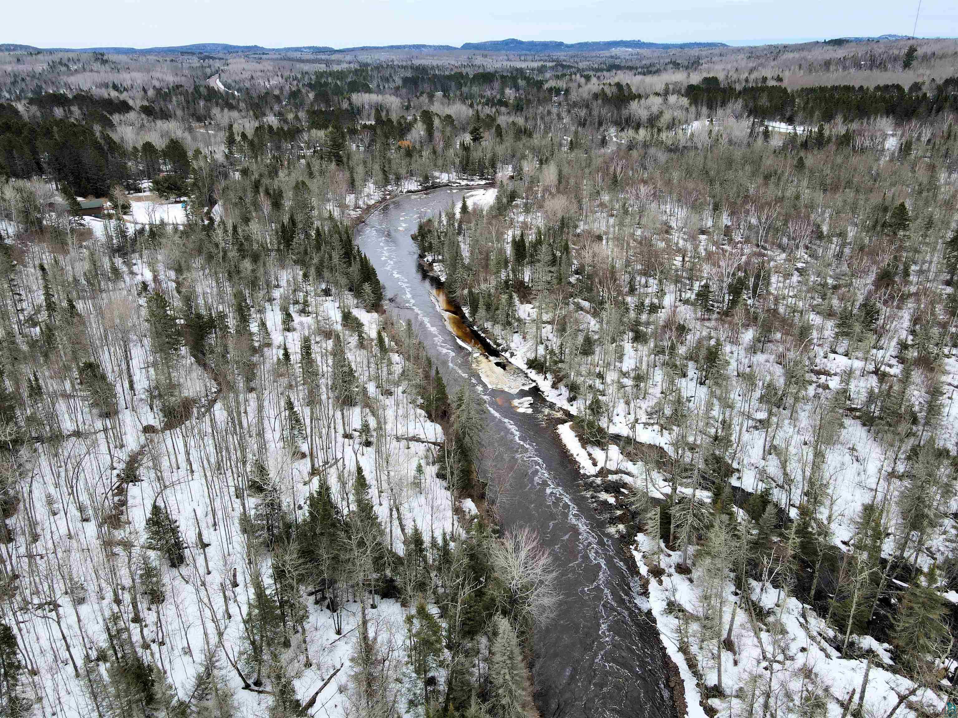 6800 Salveson Road Finland, MN 55603 - Photo 5 of 20 Snowy aerial view with a wooded view
