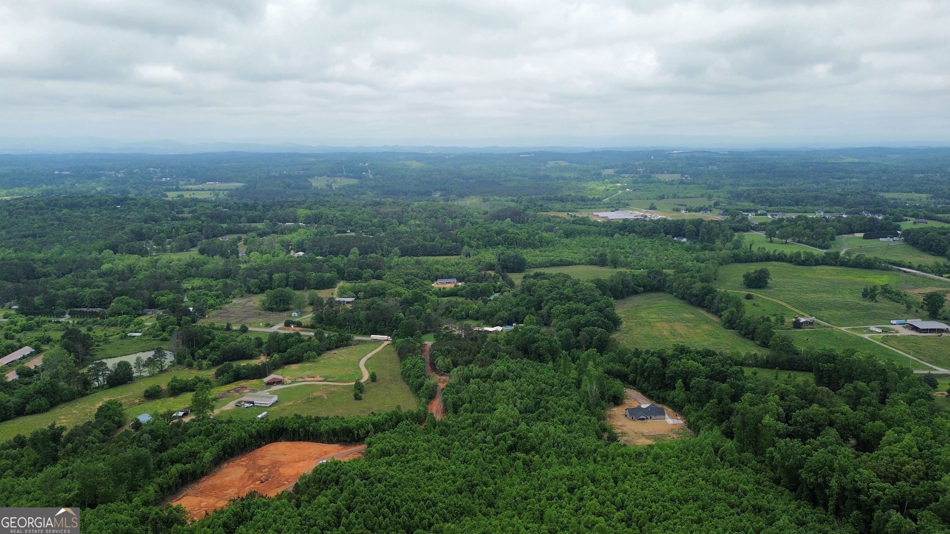 0 Hwy 151 Ringgold, GA 30736 - Photo 3 of 19 an aerial view of residential houses with outdoor space and trees