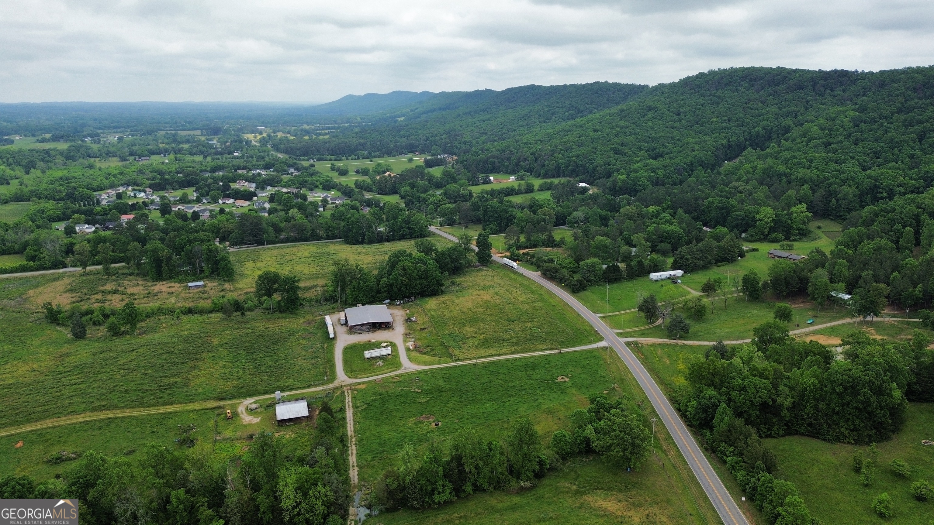 0 Hwy 151 Ringgold, GA 30736 - Photo 6 of 19 an aerial view of residential houses with outdoor space and trees
