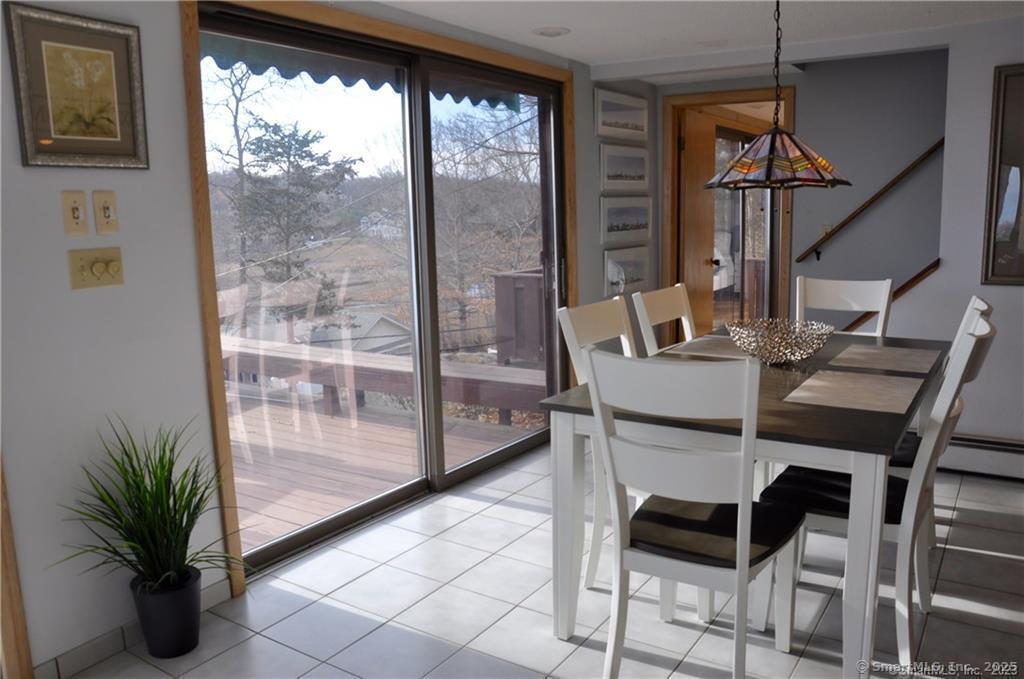 92 High Ridge Road, Unit MONTH Guilford, CT 06437 - Photo 6 of 33 Dining area.
