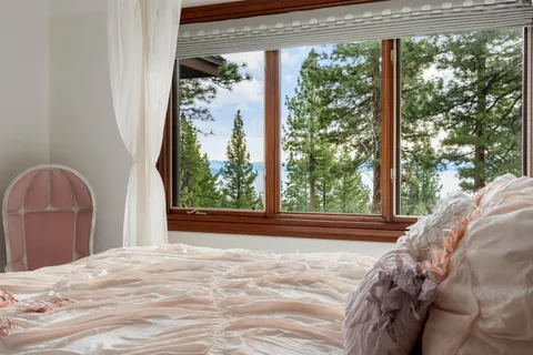 an aerial view of a house with outdoor space