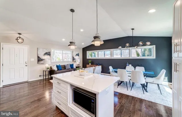a view of dining table and chairs