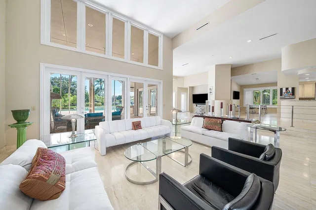 a spacious bedroom with a bed and a couch