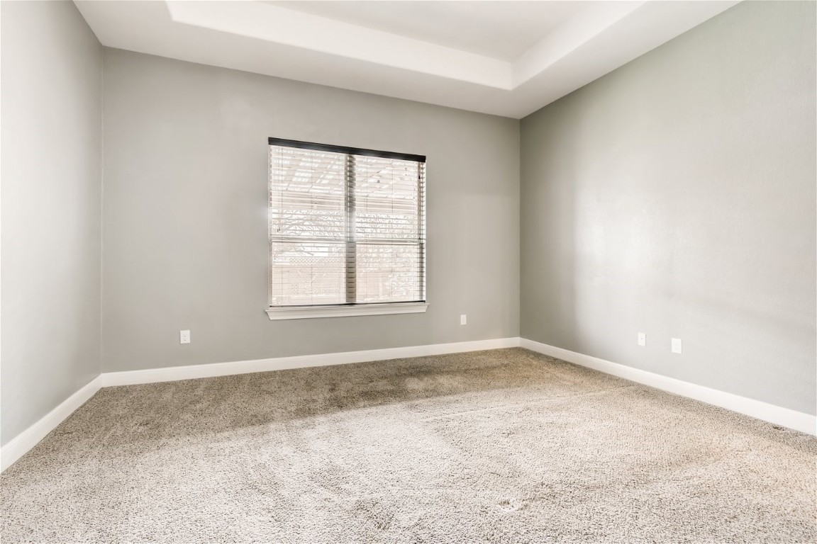 6108 Sabino Drive Spicewood, TX 78669 - Photo 13 of 22 an empty room with a window