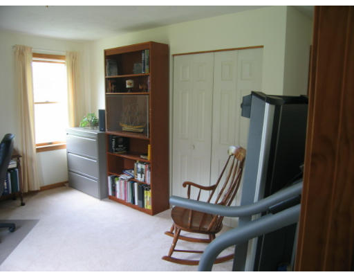 8 Brooks Pond Road North Brookfield, MA 01535 - Photo 8 of 8 a living room with furniture a air conditioner vent and a window