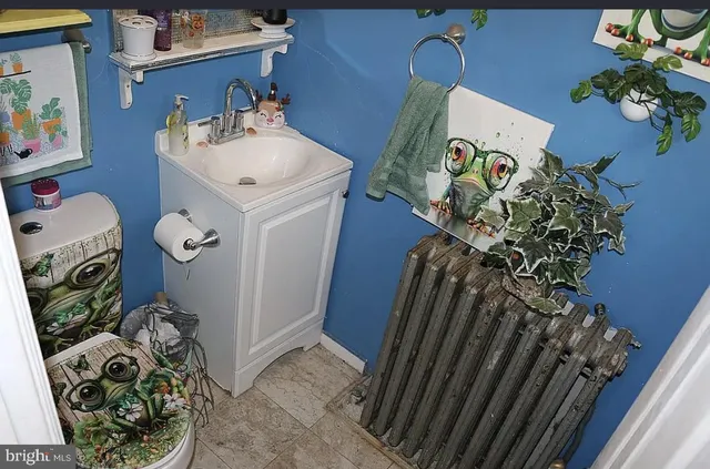 a view of a entryway with storage and utility