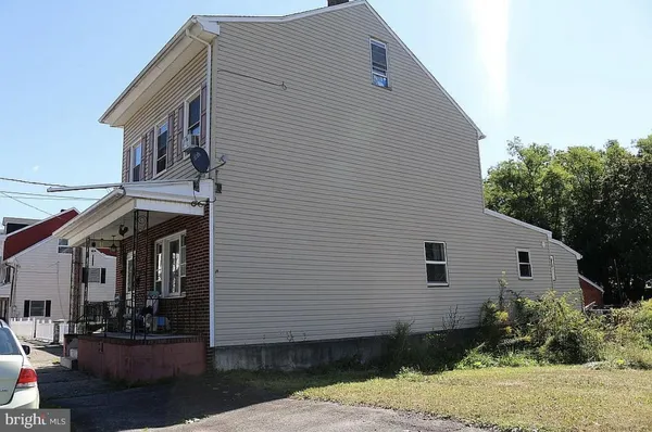 a view of a house with a patio