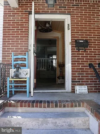 a front view of a building with glass windows