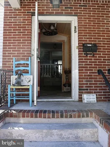 a front view of a building with glass windows