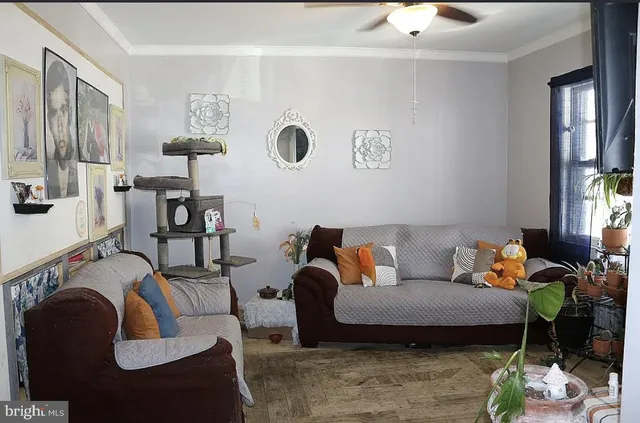 a living room with furniture and a window