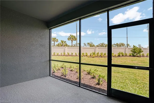 a view of a room with large window