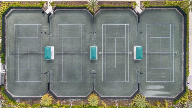 an outdoor space with furniture and umbrella
