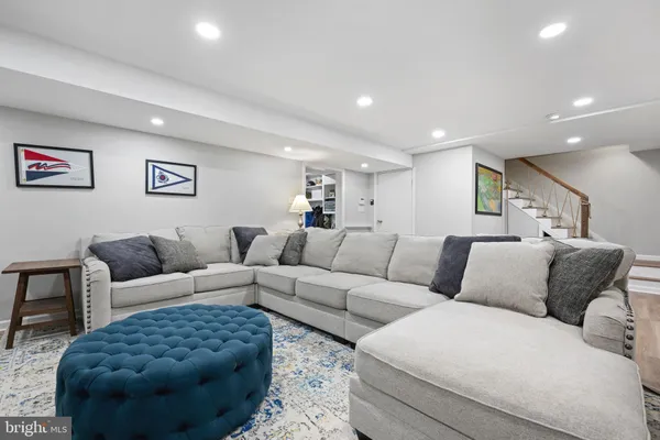 a living room with furniture and a couch