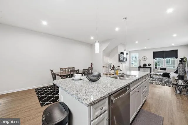 a kitchen with sink and stove