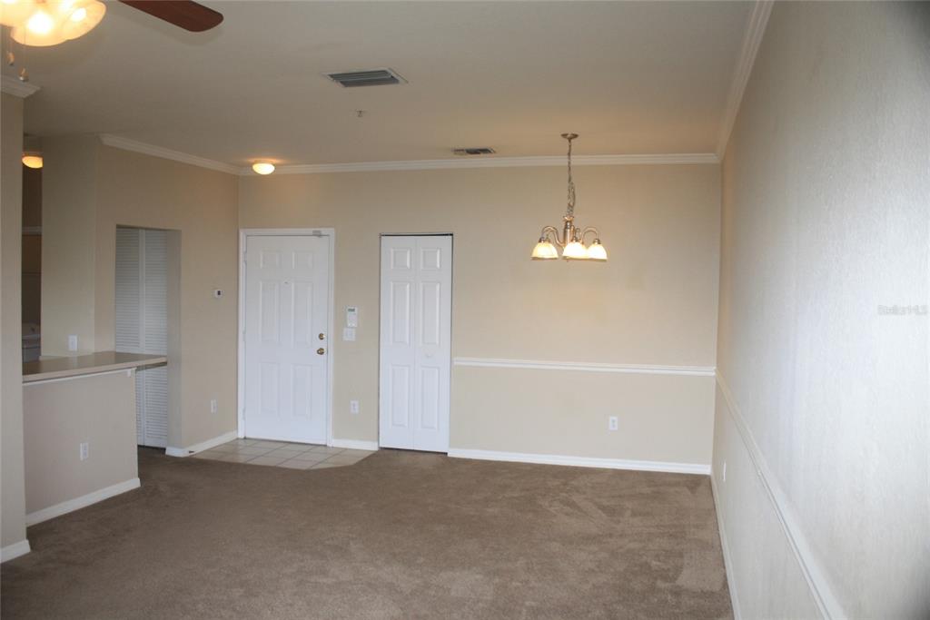 3621 Conroy Road, Unit 739 Orlando, FL 32839 - Photo 6 of 20 a view of room with a ceiling fan