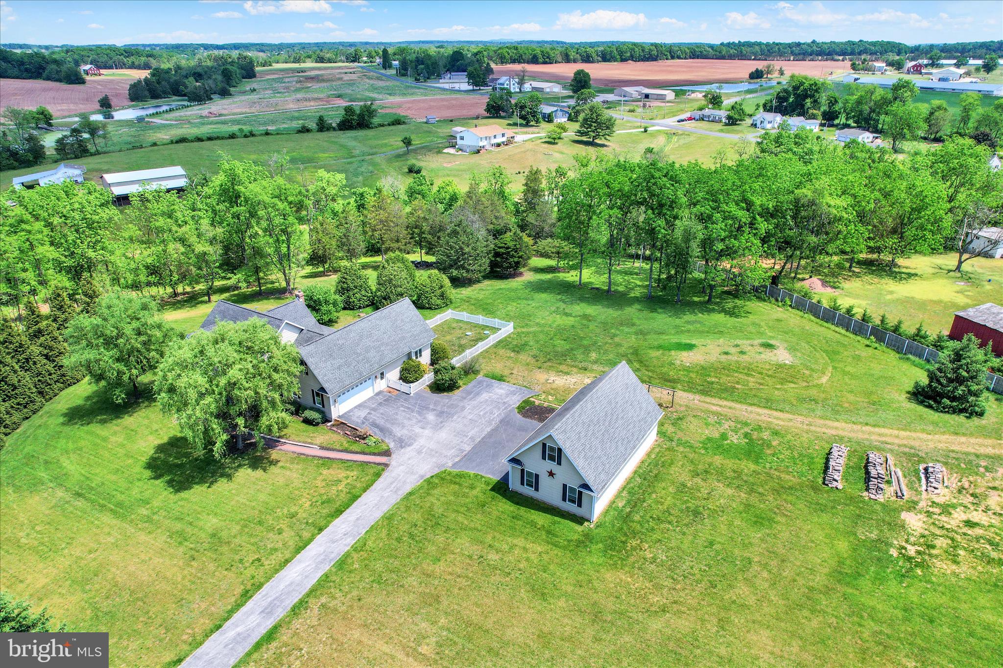 1210 White Church Road Gettysburg, PA 17325 - Photo 46 of 56 an aerial view of a house with pool outdoor seating and yard
