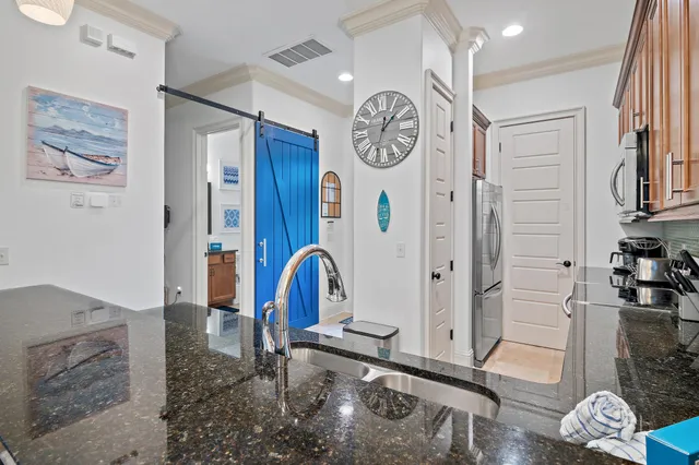 a kitchen with a cabinets and a stove top oven