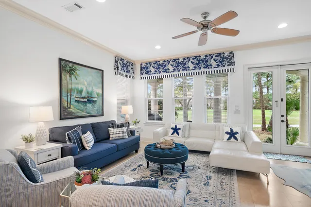 a bathroom with a granite countertop sink toilet a mirror and shower