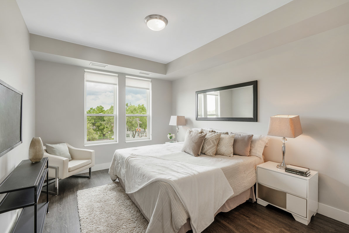 101 West Liberty Street, Unit 106 Barrington, IL 60010 - Photo 6 of 16 a bedroom with bed and a window