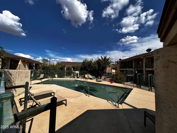 a room with lots of wooden furniture