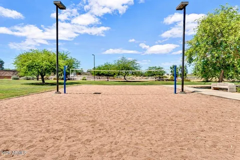 a view of a street with a yard
