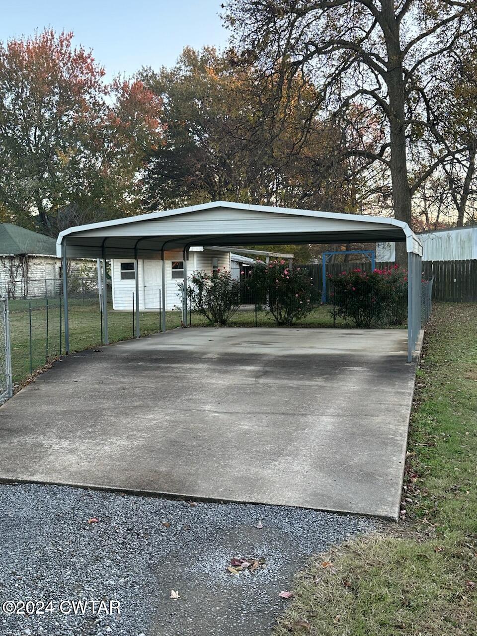 307 King Street Ridgely, TN 38080 - Photo 3 of 15 a view of a house with a yard and large tree