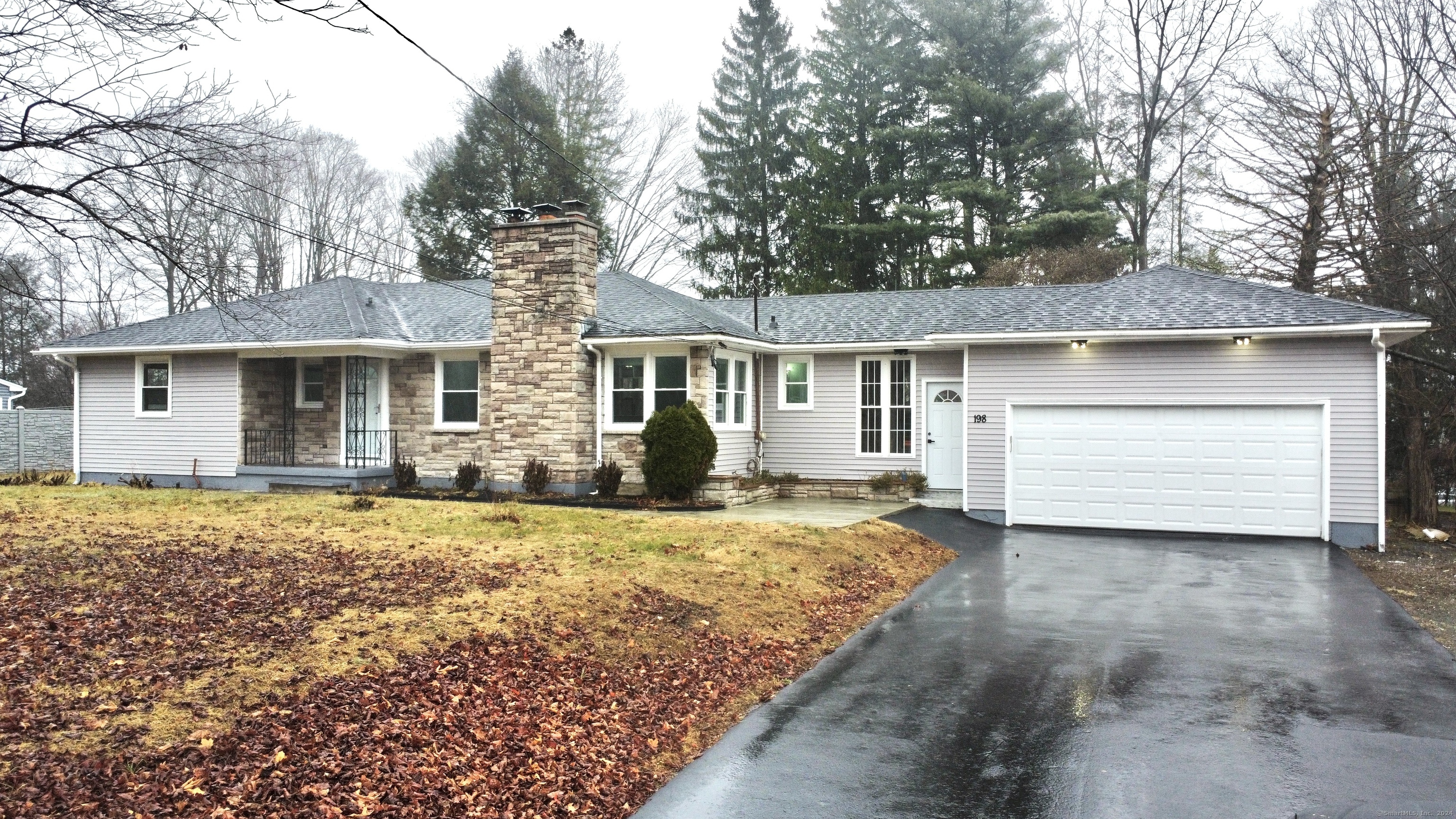 198 Ross Road Middlefield, CT 06481 - Photo 1 of 1 a front view of a house with a yard