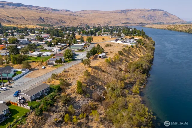 a view of a city with mountains in the background