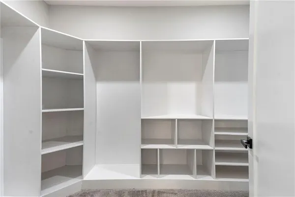 a view of an empty walk in closet