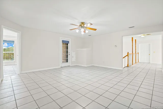 a view of a room with a large window