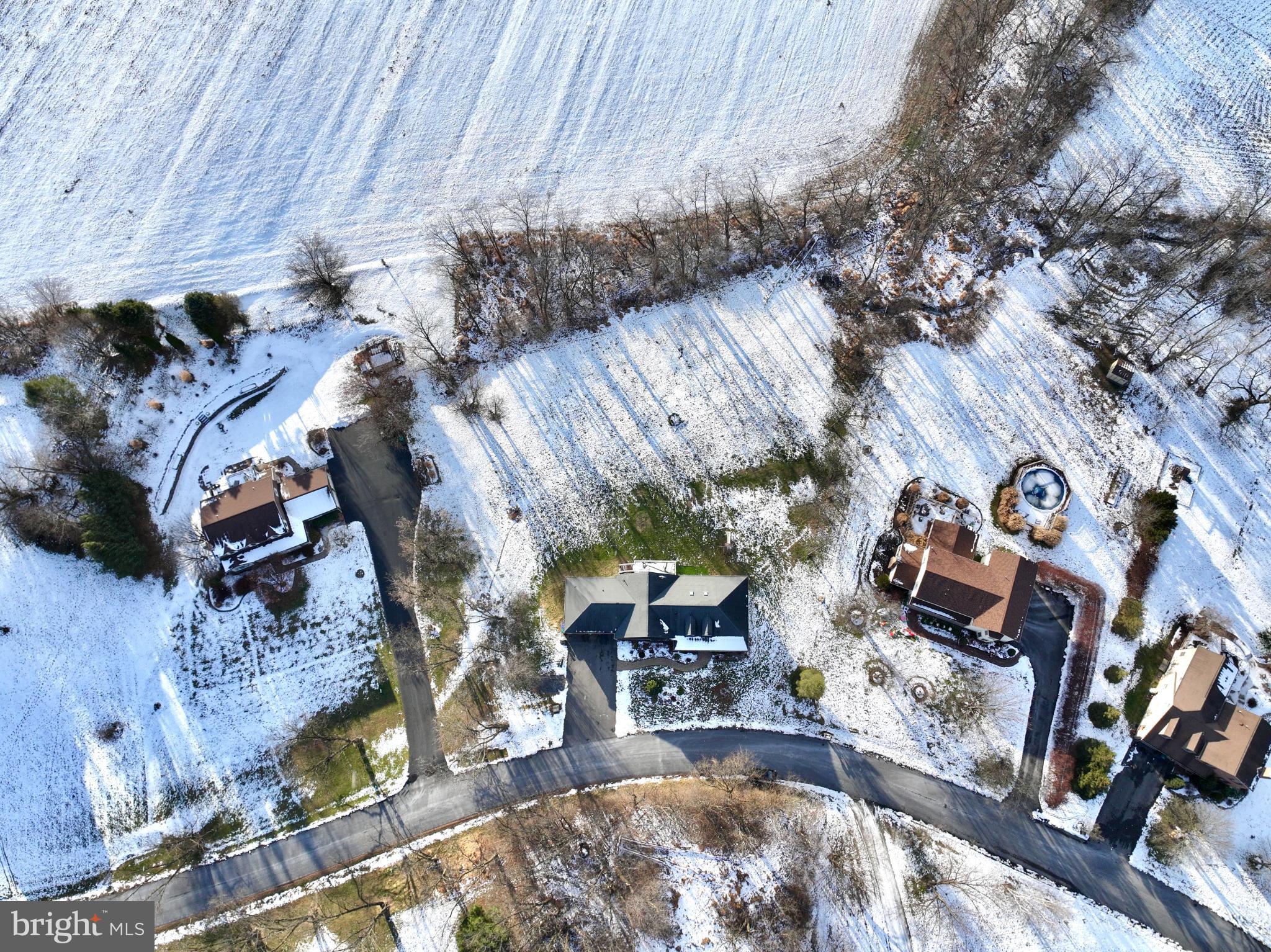 223 Country Road Lewisburg, PA 17837 - Photo 3 of 46 Snowy landscape with charming homes below.