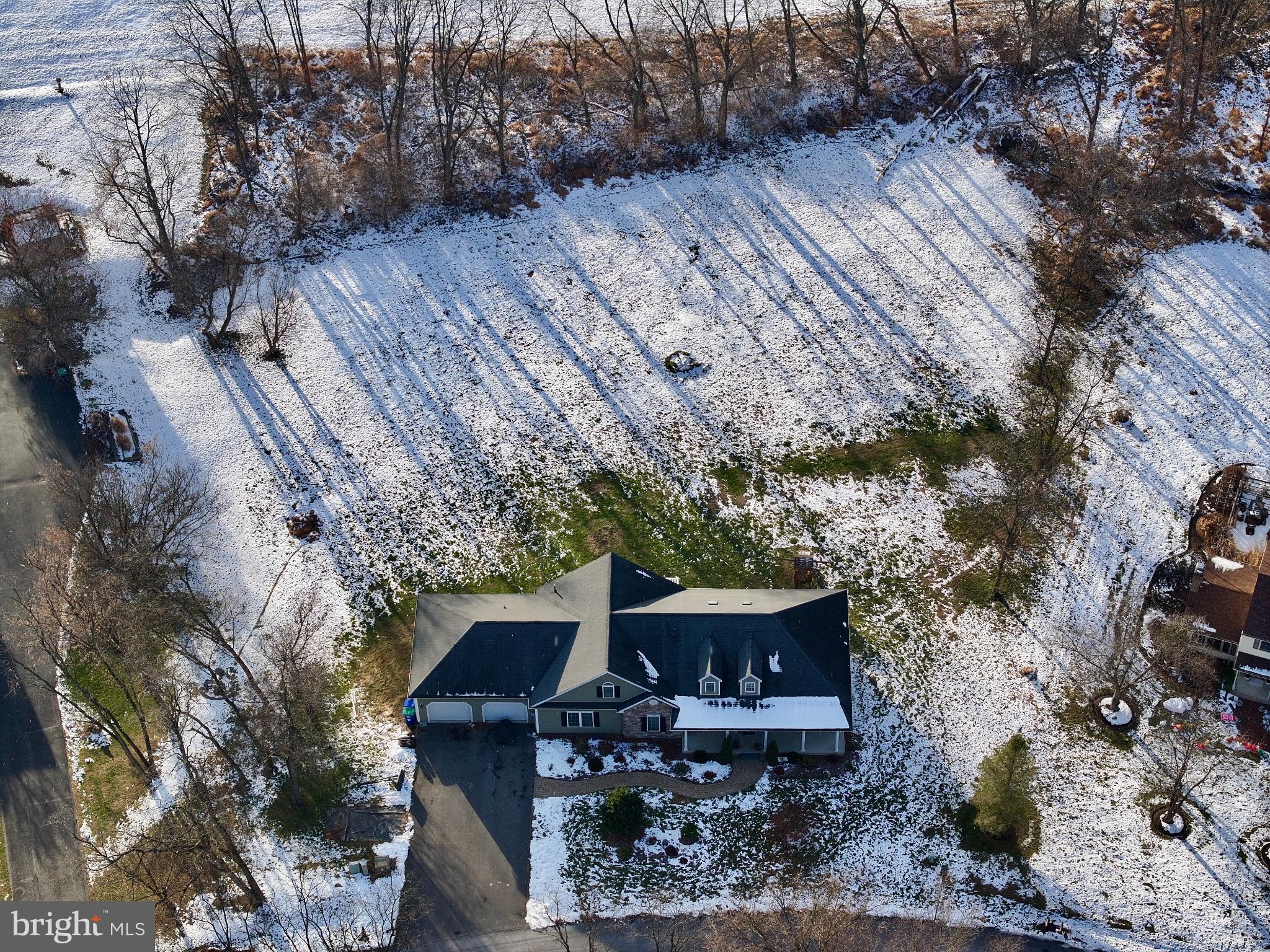 223 Country Road Lewisburg, PA 17837 - Photo 6 of 46 Charming home nestled in a snowy landscape.