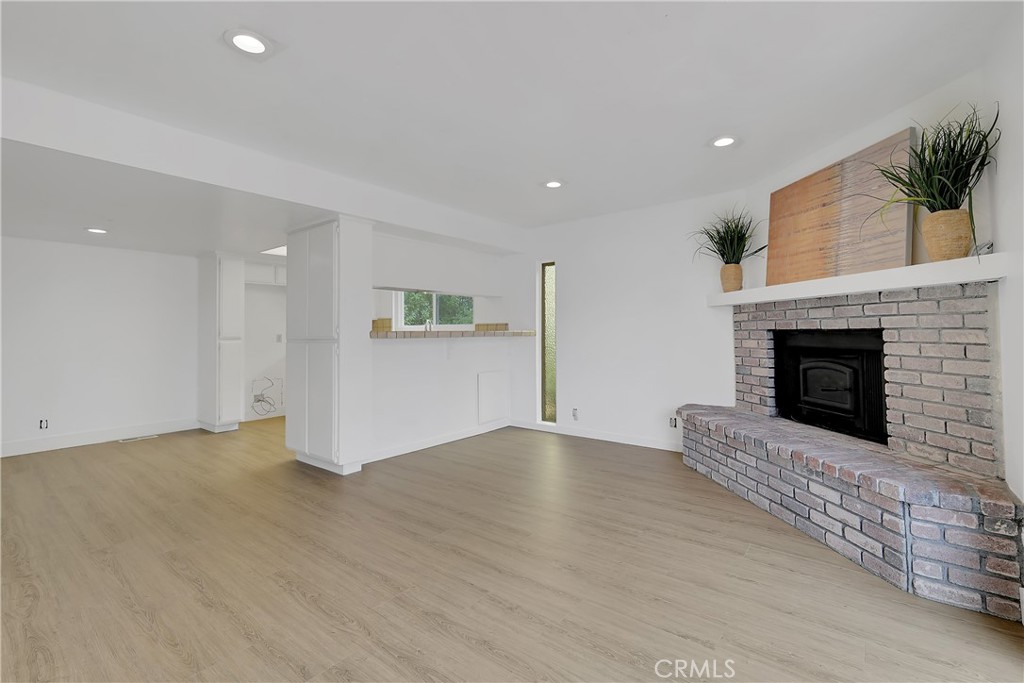 75 Lariat Loop Oroville, CA 95966 - Photo 11 of 47 a view of empty room with wooden floor and fireplace