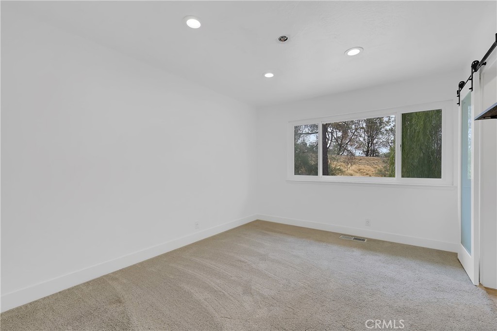 75 Lariat Loop Oroville, CA 95966 - Photo 24 of 47 an empty room with a window