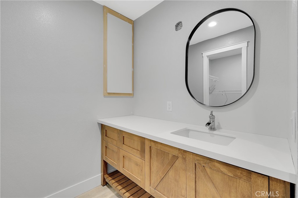 75 Lariat Loop Oroville, CA 95966 - Photo 29 of 47 a bathroom with a sink and a mirror