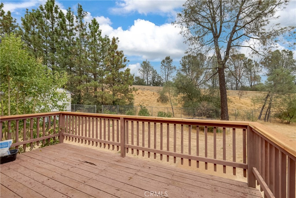 75 Lariat Loop Oroville, CA 95966 - Photo 35 of 47 a view of balcony with wooden floor and fence