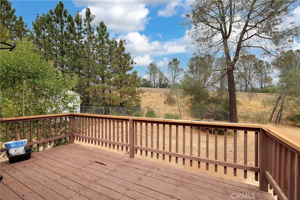 75 Lariat Loop Oroville, CA 95966 - Photo 36 of 47 a view of balcony with wooden floor and fence