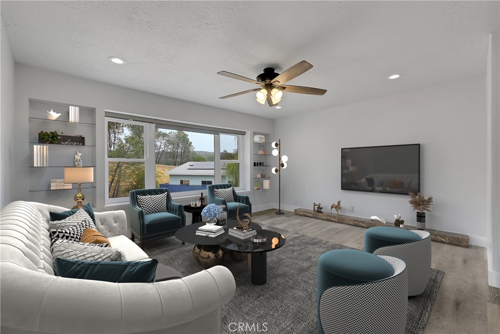 75 Lariat Loop Oroville, CA 95966 - Photo 4 of 47 a living room with furniture and a flat screen tv