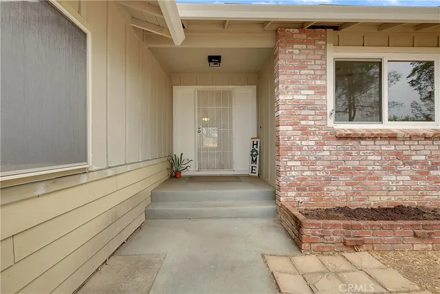 a view of house with outdoor space