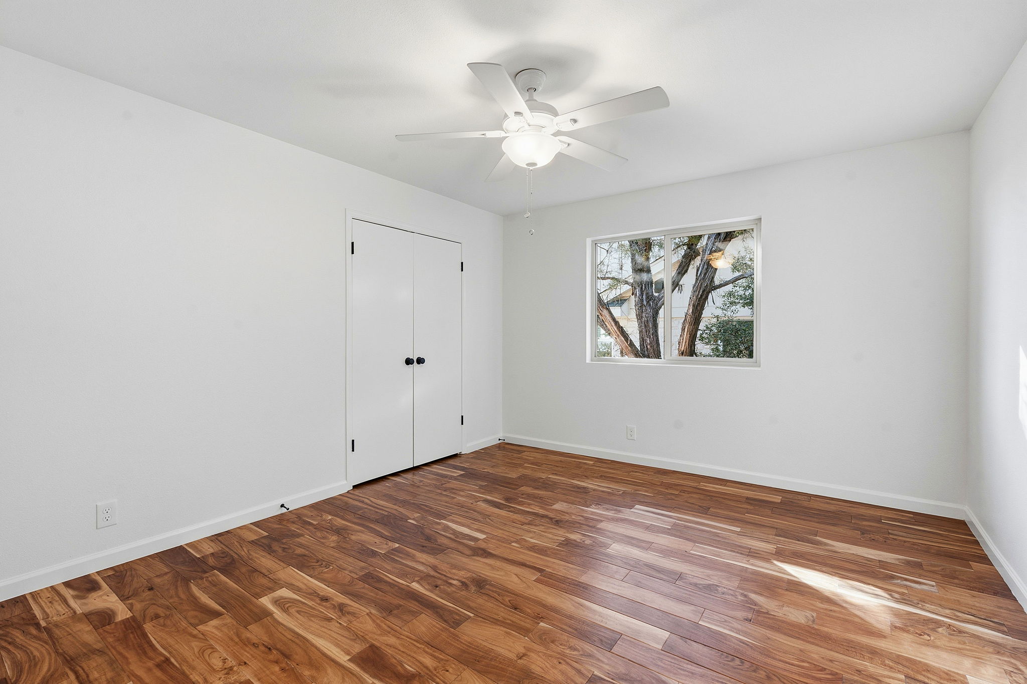 7801 Image Cove Austin, TX 78730 - Photo 14 of 26 a view of empty room with window