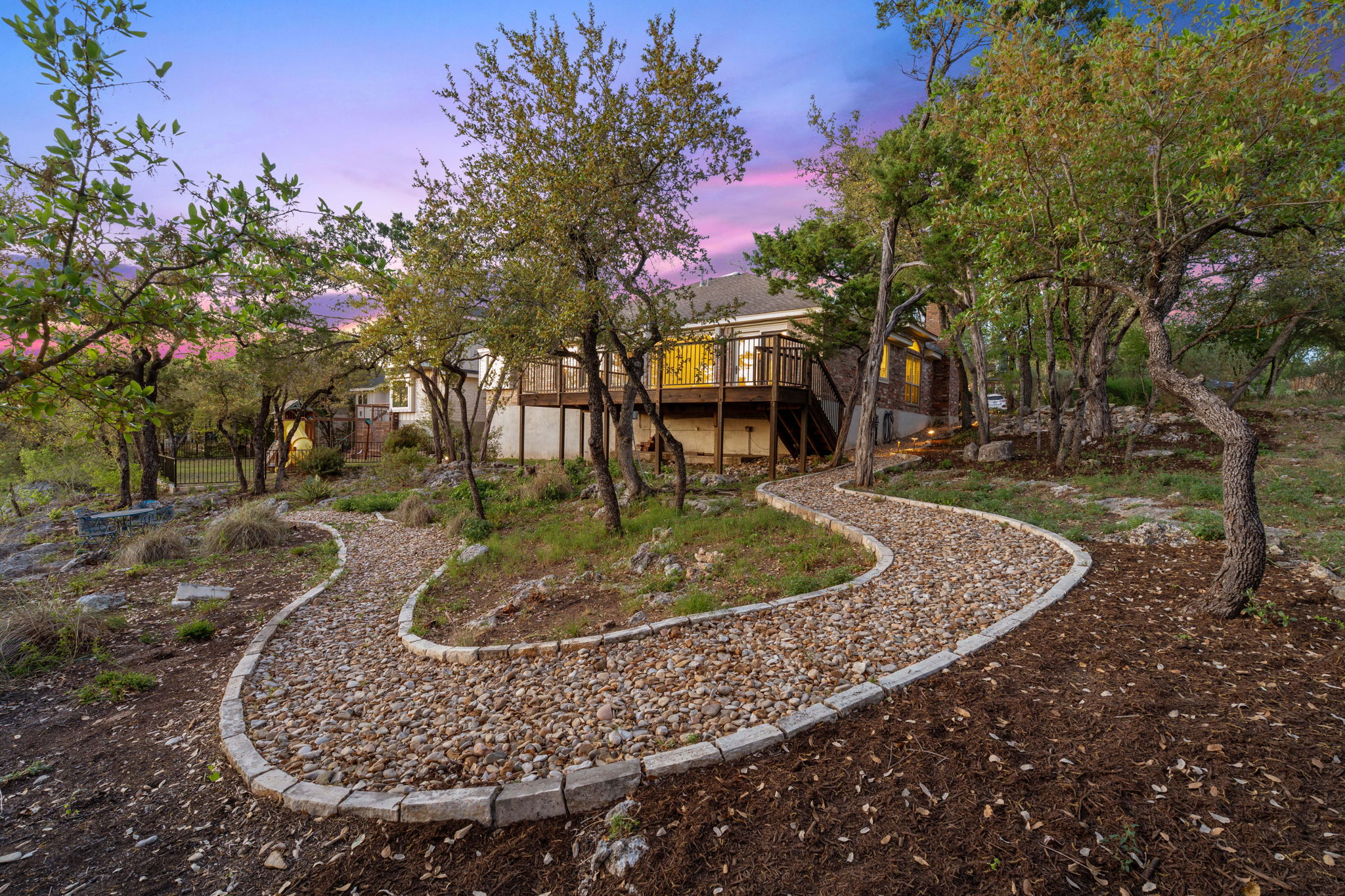 7801 Image Cove Austin, TX 78730 - Photo 21 of 26 a view of a yard with tree s