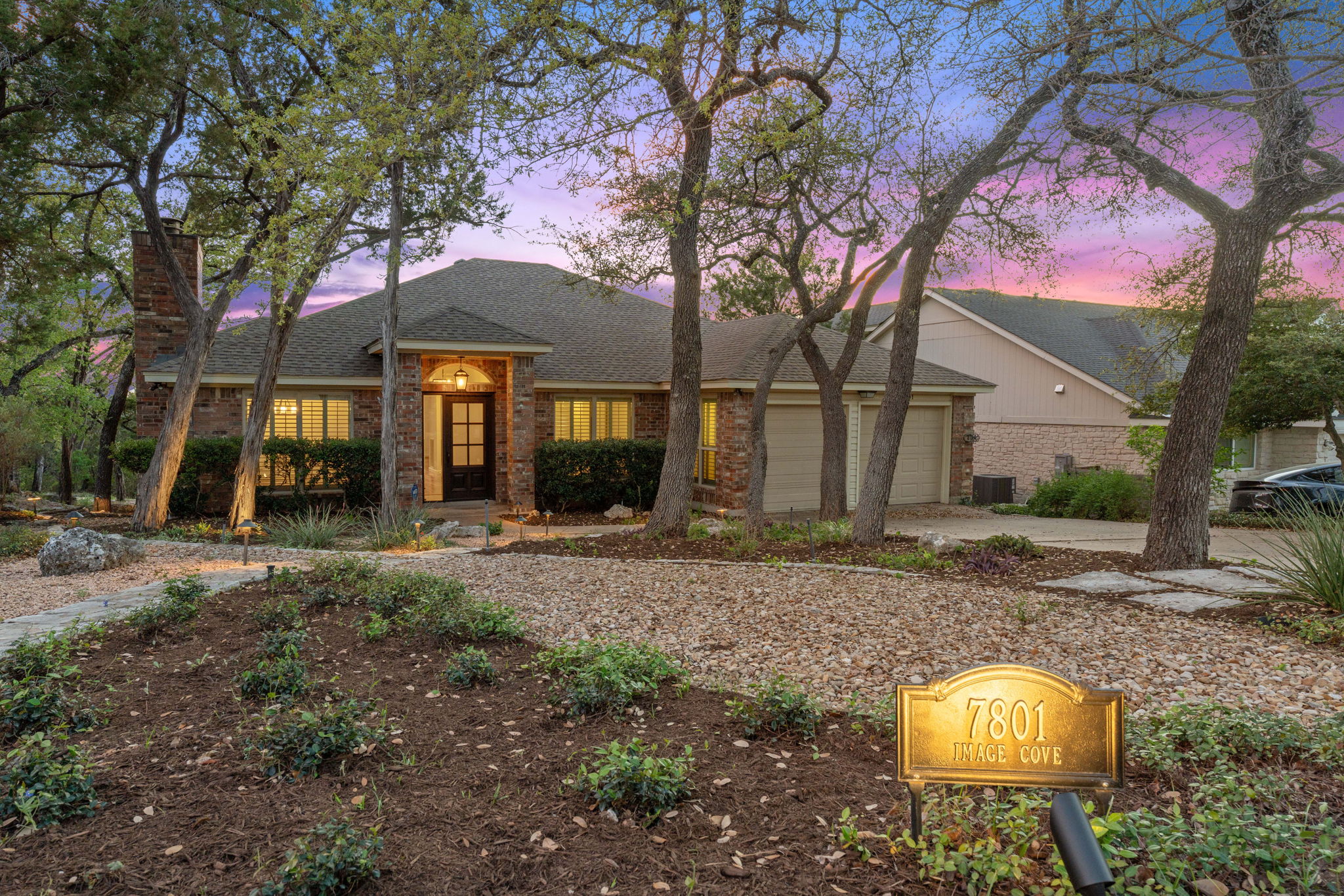 7801 Image Cove Austin, TX 78730 - Photo 25 of 26 a backyard of a house with barbeque oven table and chairs