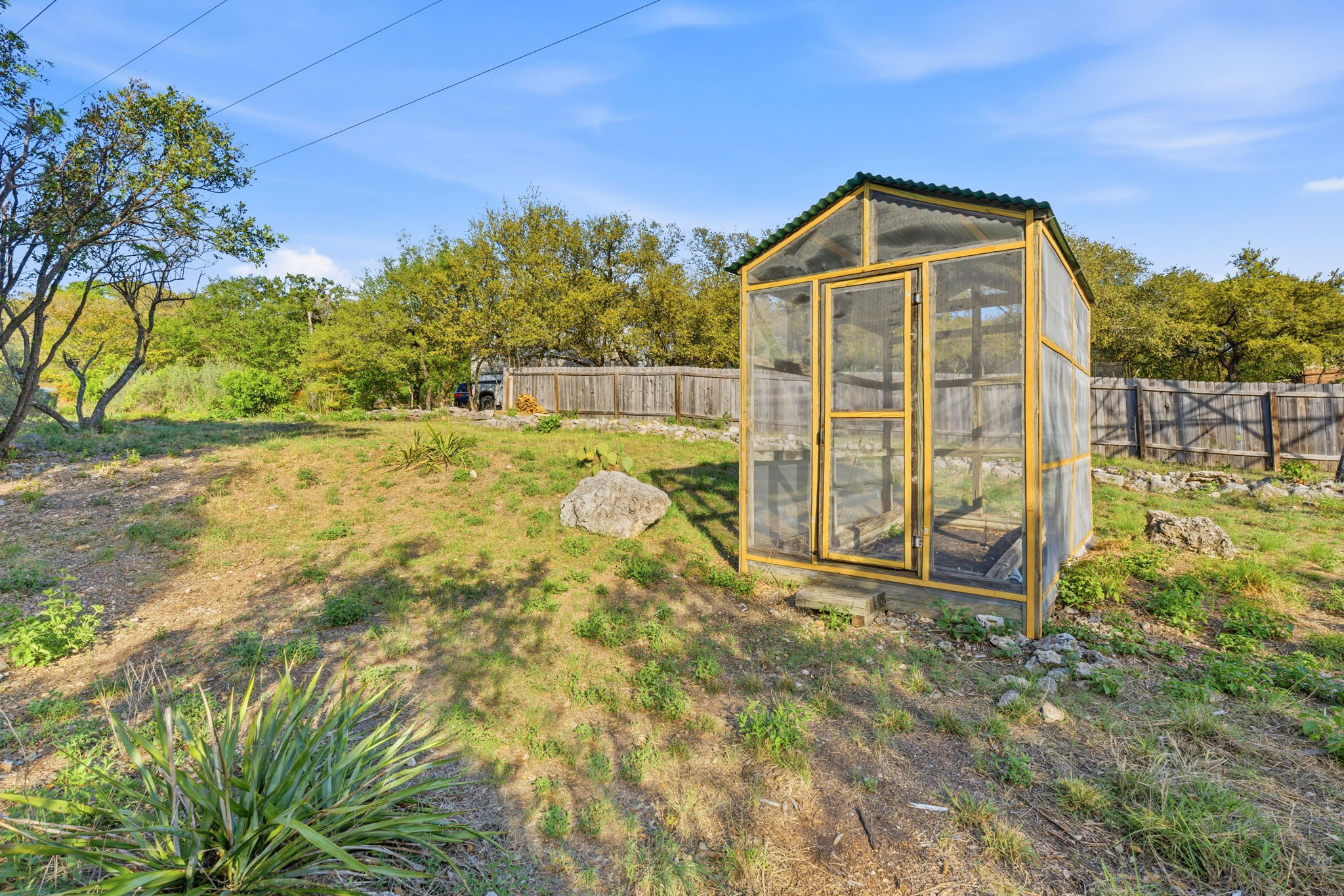 7801 Image Cove Austin, TX 78730 - Photo 26 of 26 a view of backyard of the house