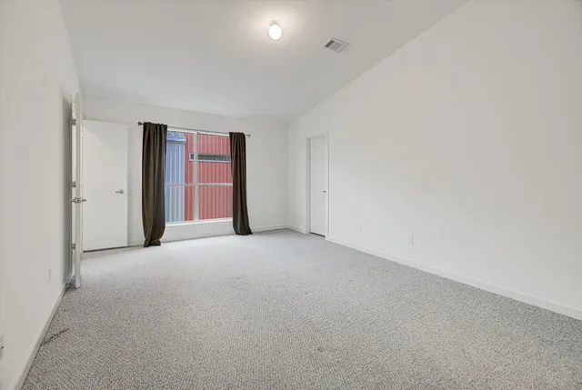 a bathroom with a sink toilet and mirror