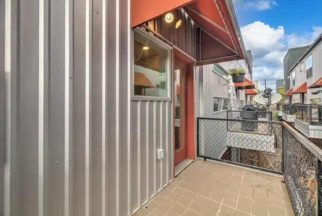 an aerial view of a city with lots of residential buildings