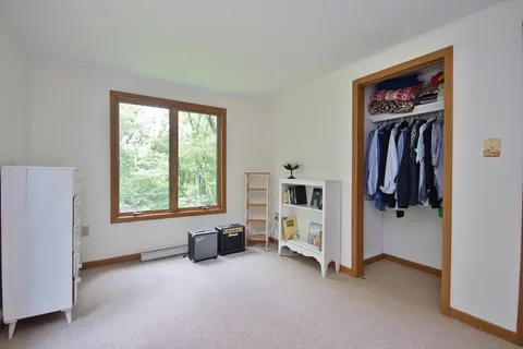 a view of livingroom with furniture and windows