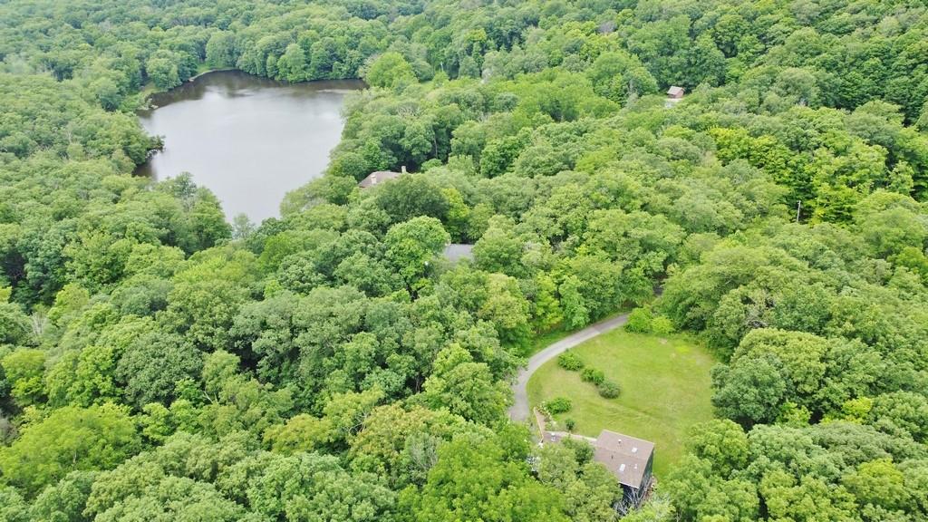 107 Lane Gate Road Cold Spring, NY 10516 - Photo 3 of 45 an aerial view of a house with a yard and large trees