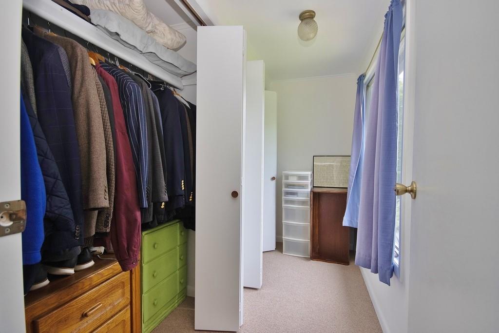 107 Lane Gate Road Cold Spring, NY 10516 - Photo 31 of 45 a view of walk in closet with clothes and shoes