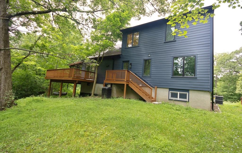 107 Lane Gate Road Cold Spring, NY 10516 - Photo 38 of 45 a front view of a house with garden