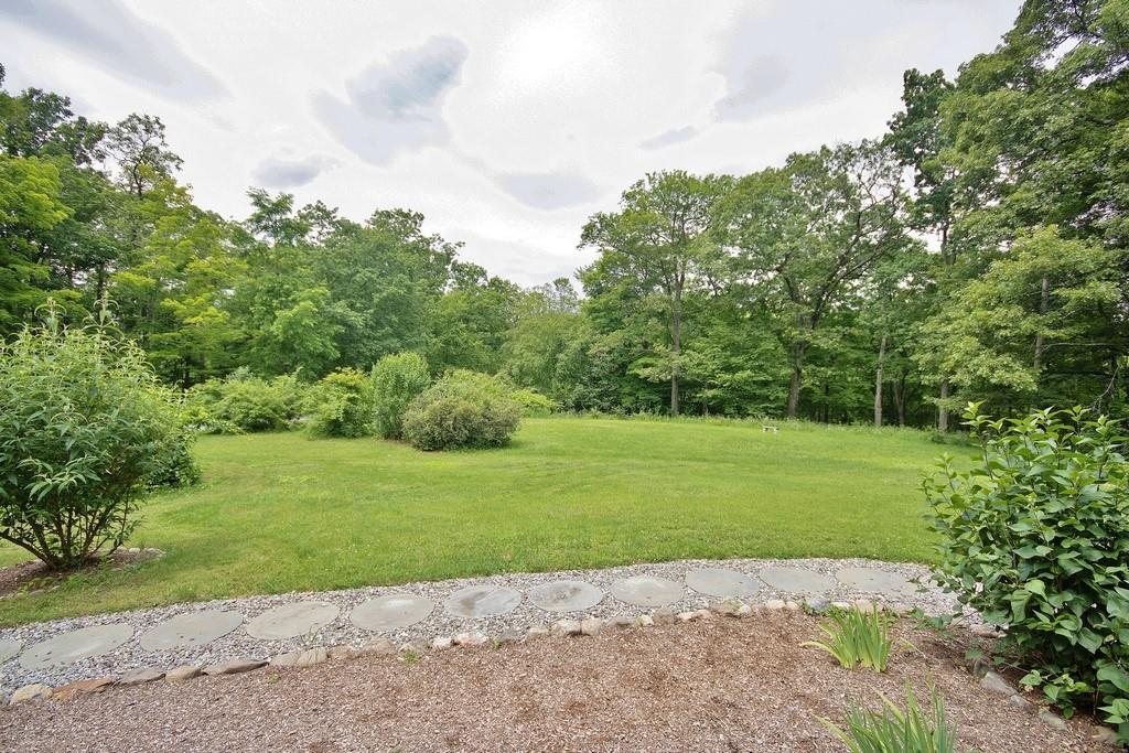 107 Lane Gate Road Cold Spring, NY 10516 - Photo 42 of 45 a view of a field with a trees in the background